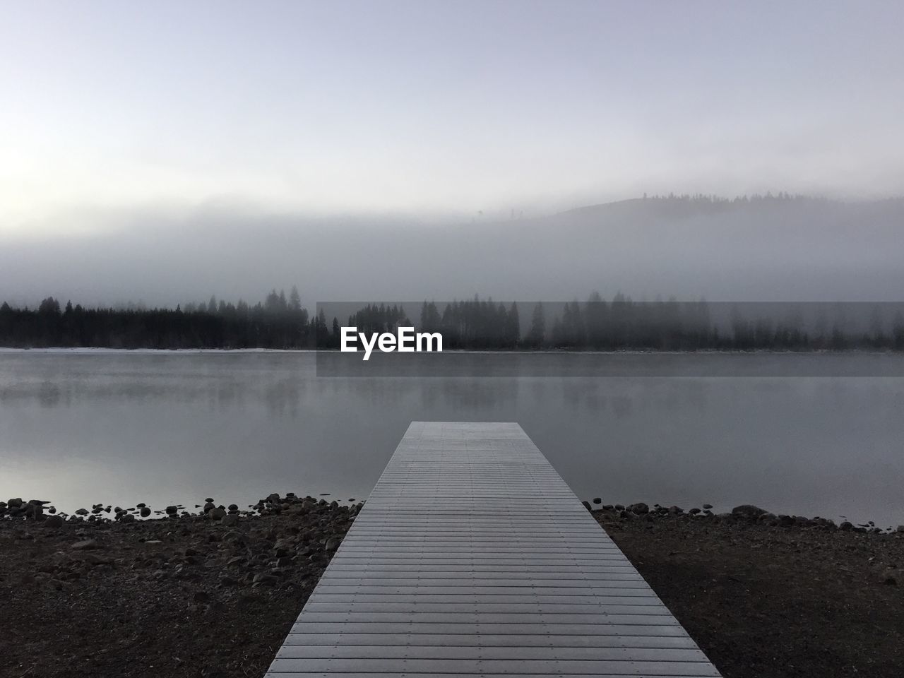 Pier over donner lake during foggy weather