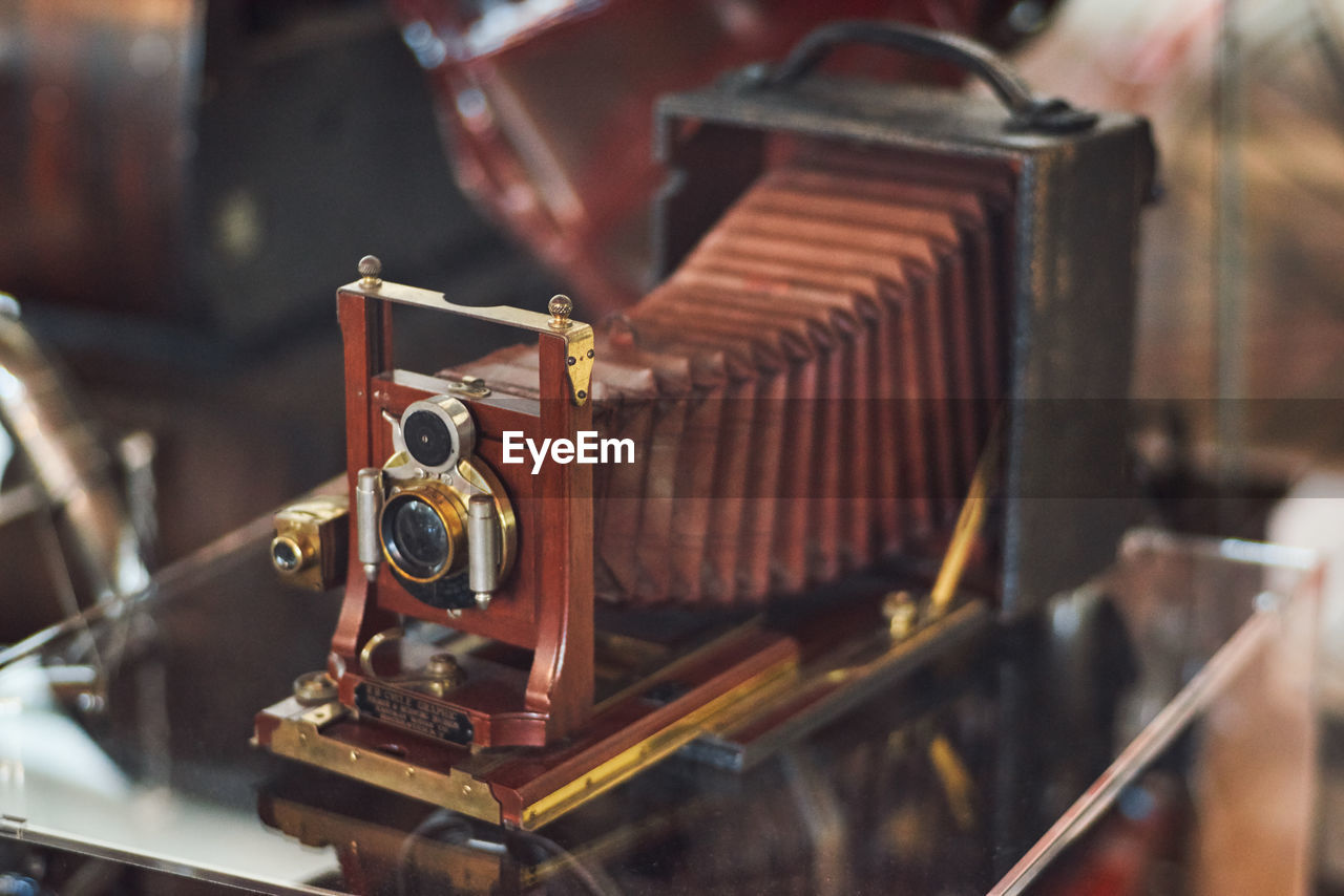 Close-up of vintage camera on table