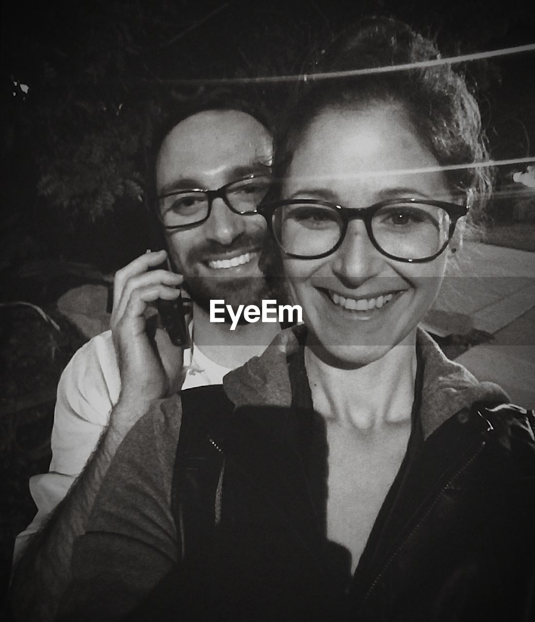 Portrait of smiling couple wearing eyeglasses