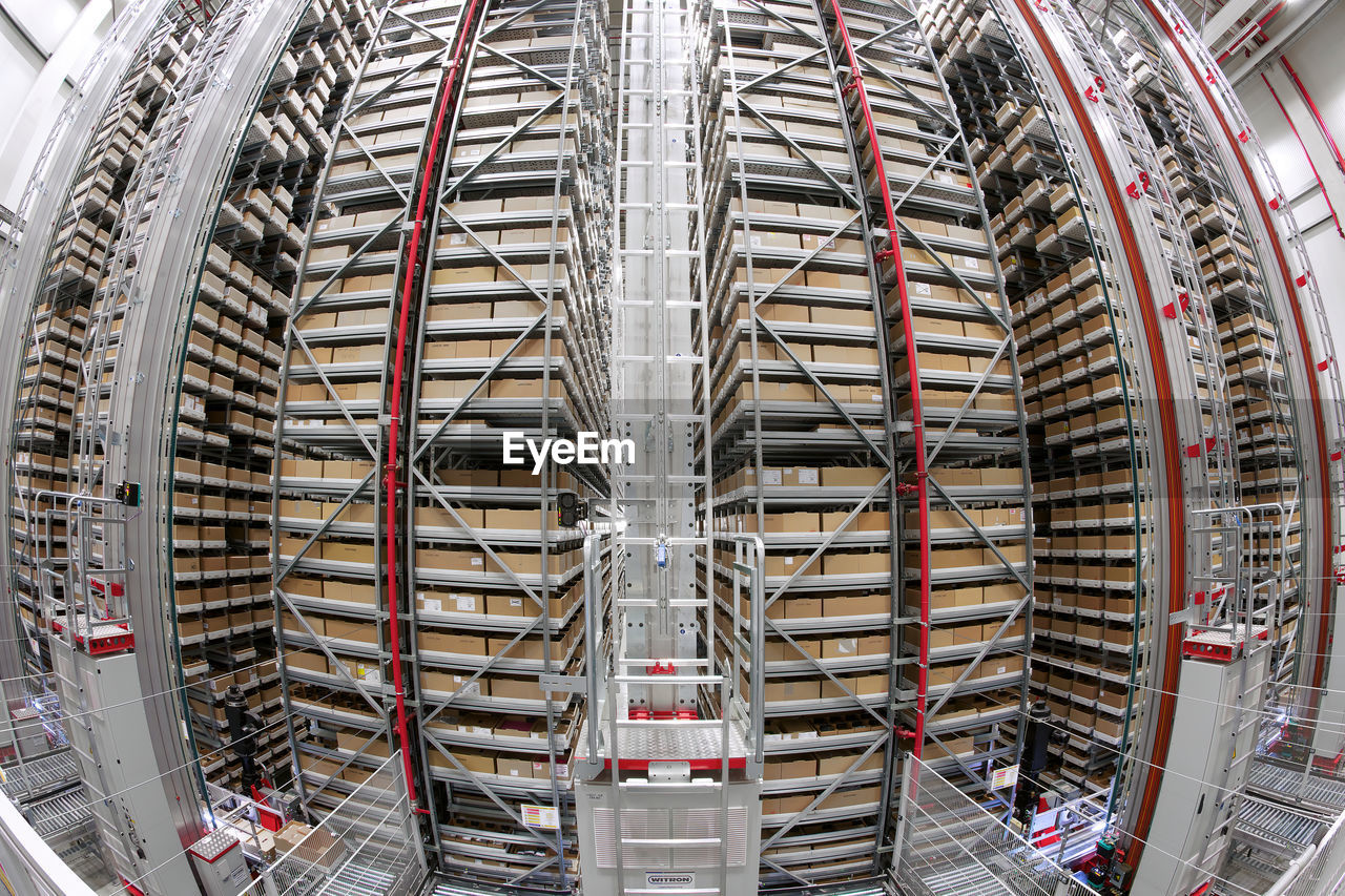 High angle view of automated warehouse. plastic boxes put in the pallet in shelf rack in warehouse.