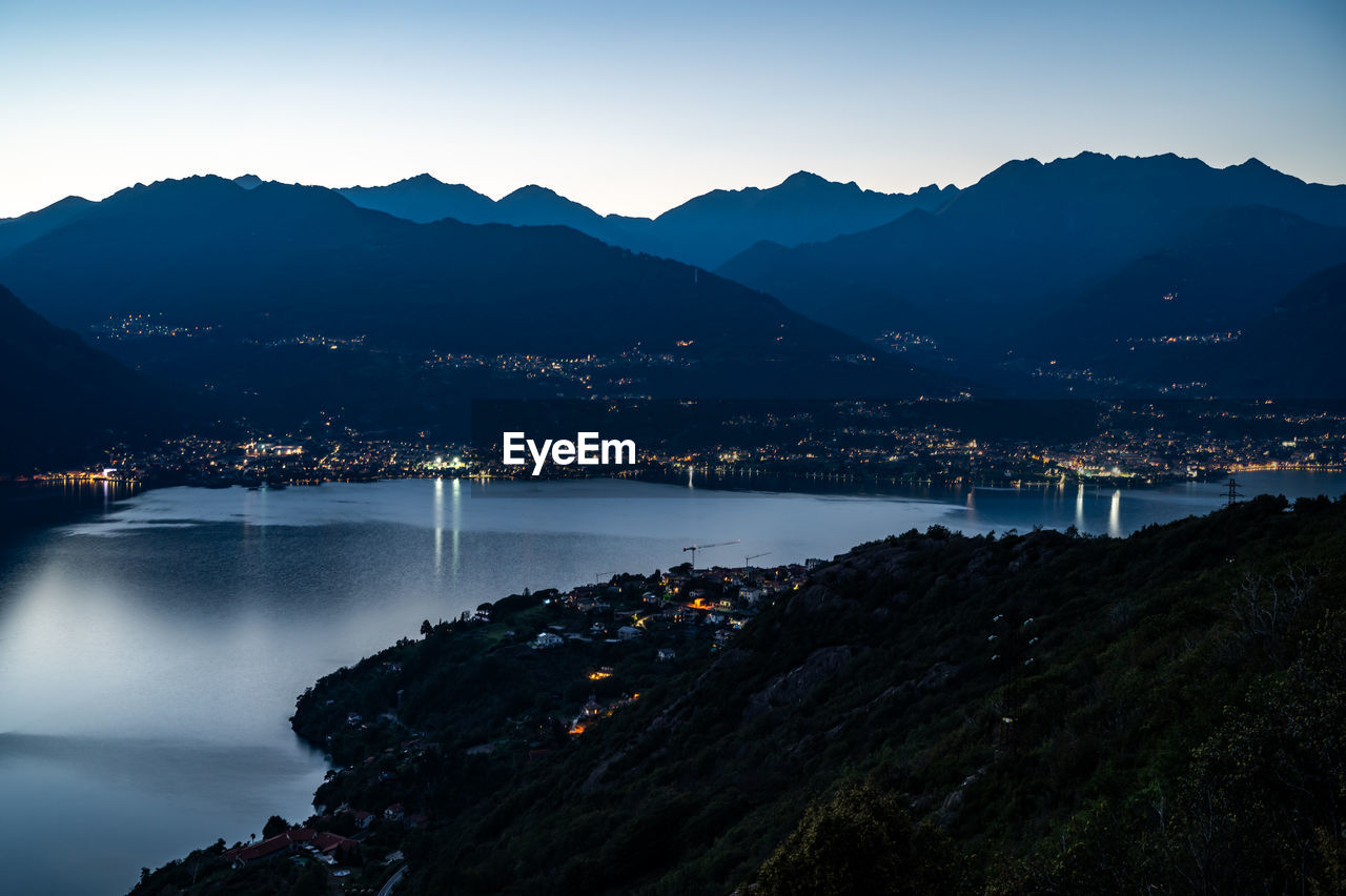 A view of lake como from the church of san rocco, in dorio, towards the south, at dusk.