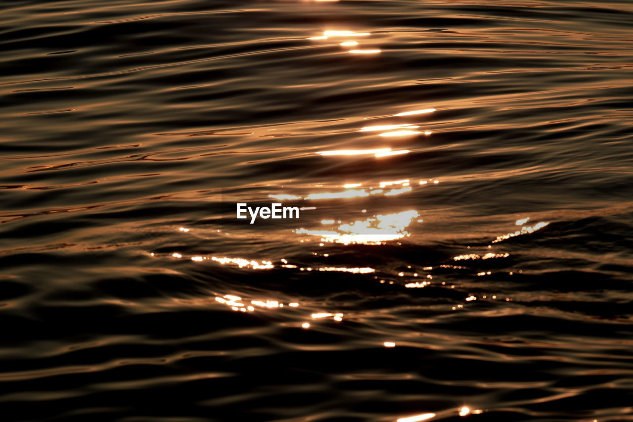 Full frame shot of sea at sunset