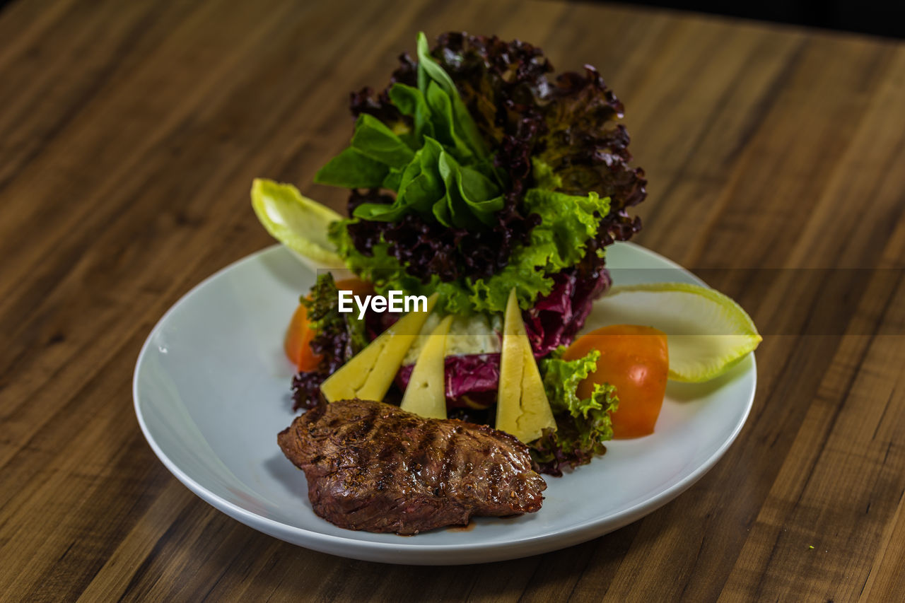 Close-up of meal served in plate on table