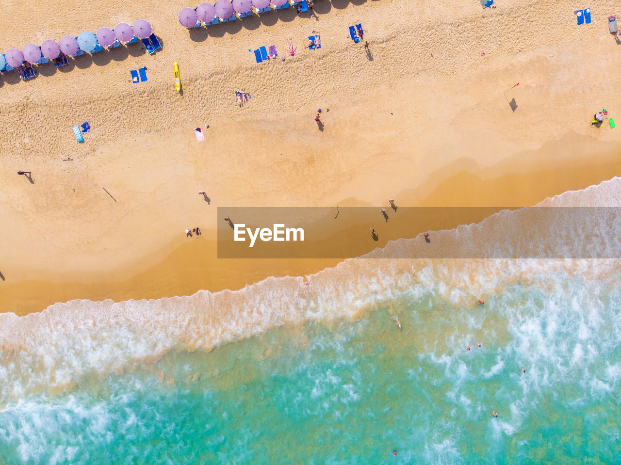 Aerial view of people enjoying at beach