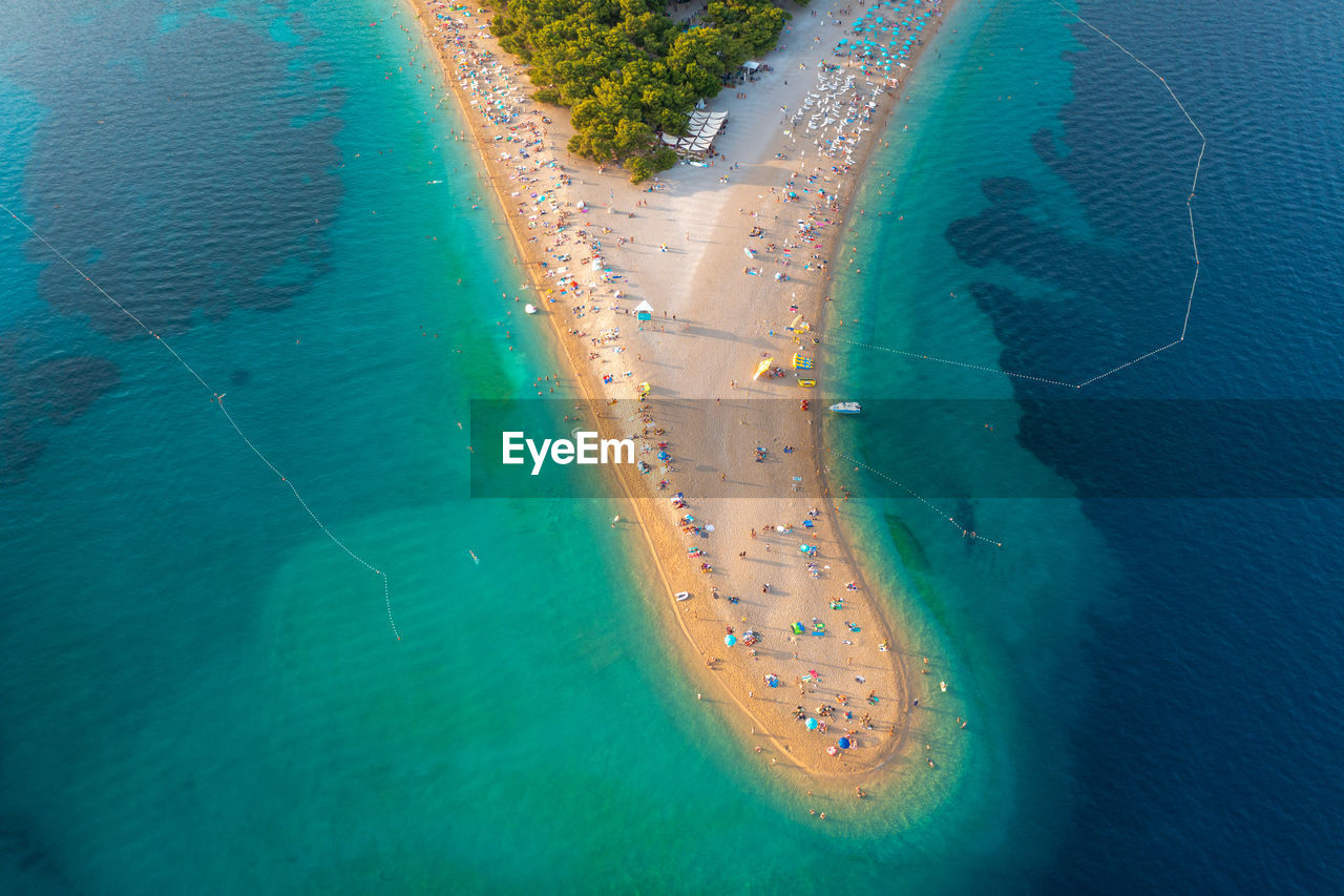 Aerial scene of zlatni rat beach on brac island, croatia