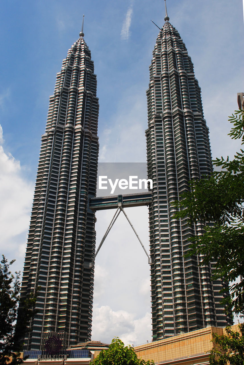 Low angle view of modern buildings against sky