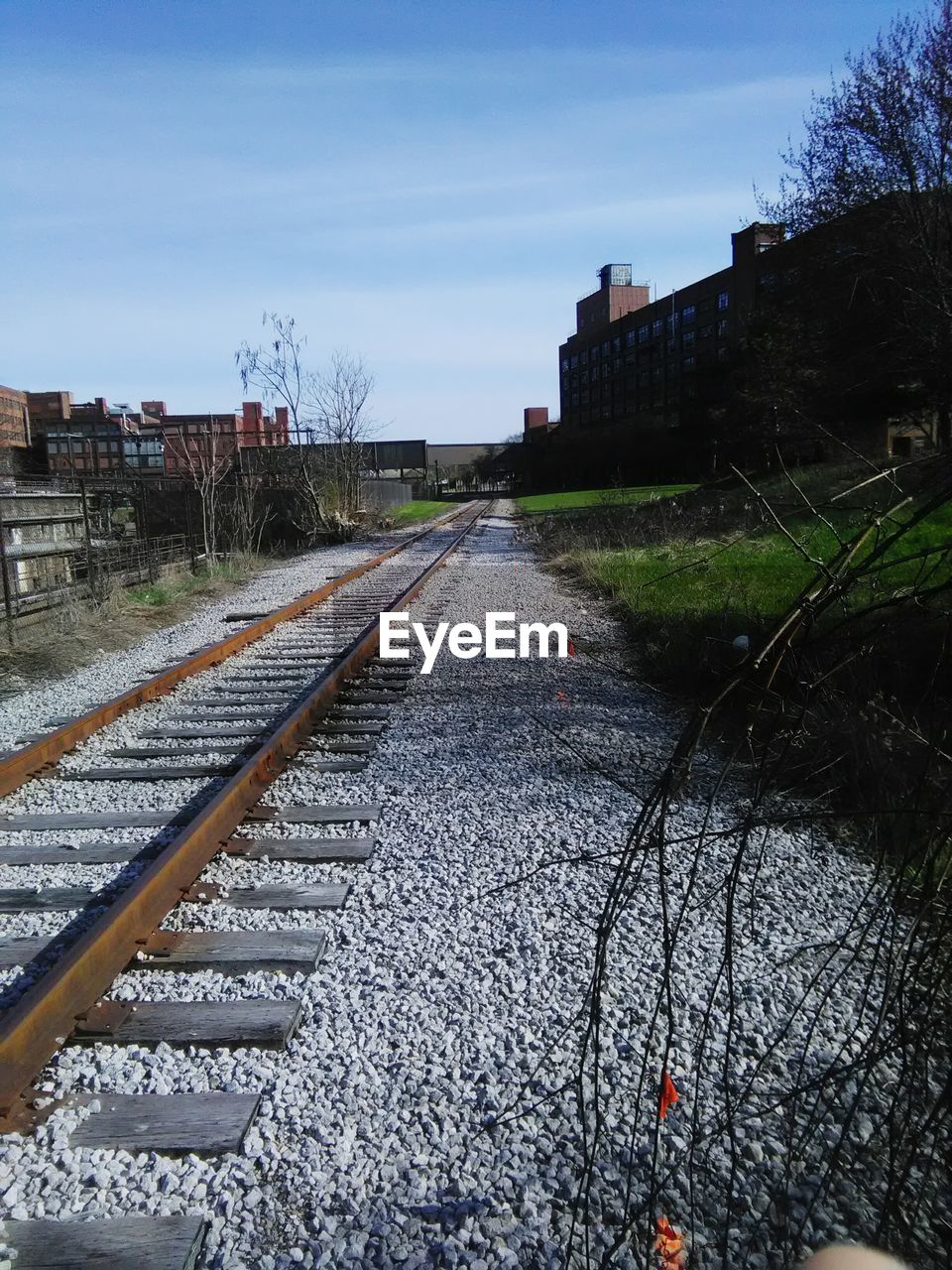 SURFACE LEVEL OF RAILWAY TRACKS ALONG BUILDINGS