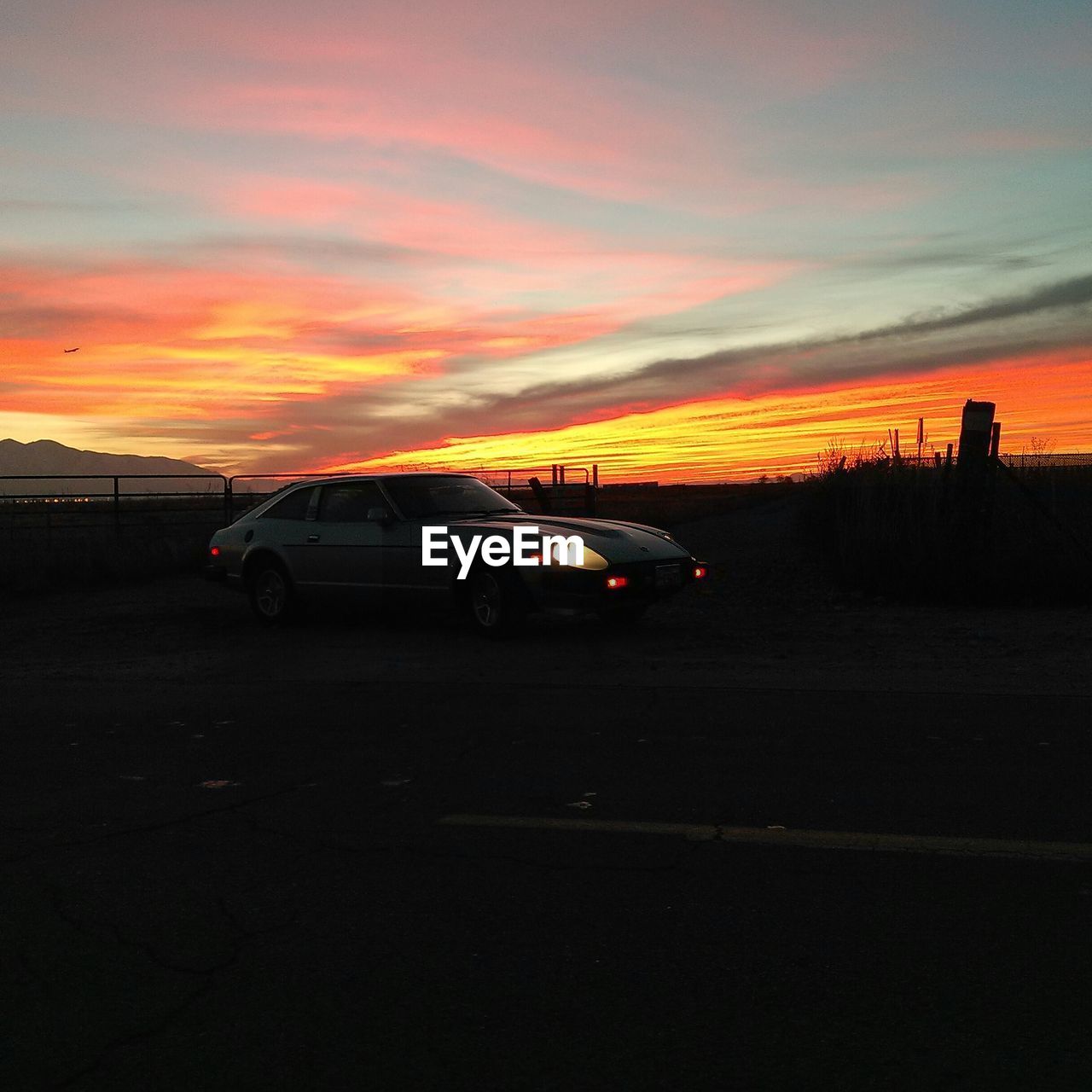 SUNSET OVER ROAD