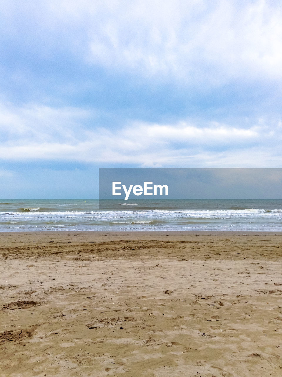 VIEW OF BEACH AGAINST SKY