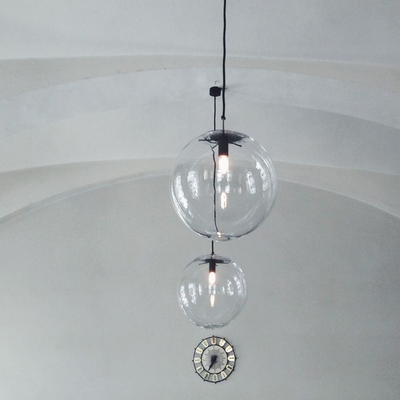 Electric lights hanging from ceiling