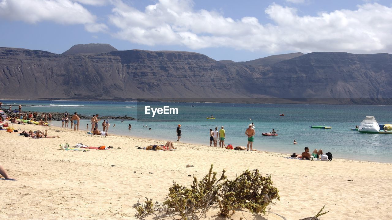 TOURISTS ON BEACH