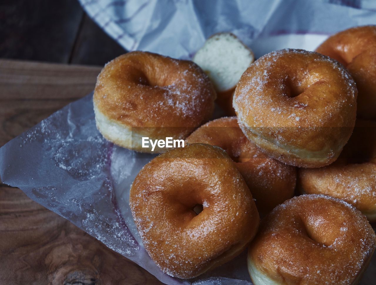 High angle view of donuts on wax paper