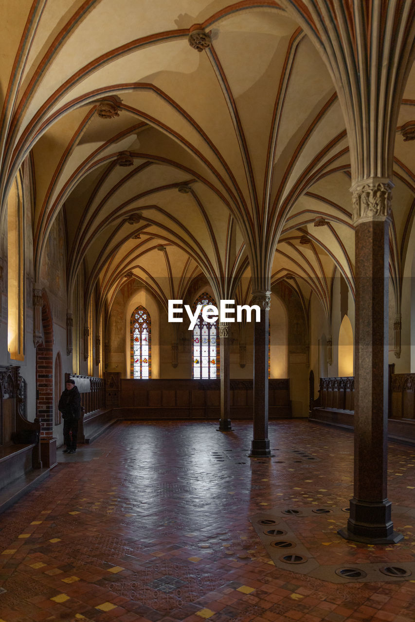 Interior of illuminated building, malbork castle. 