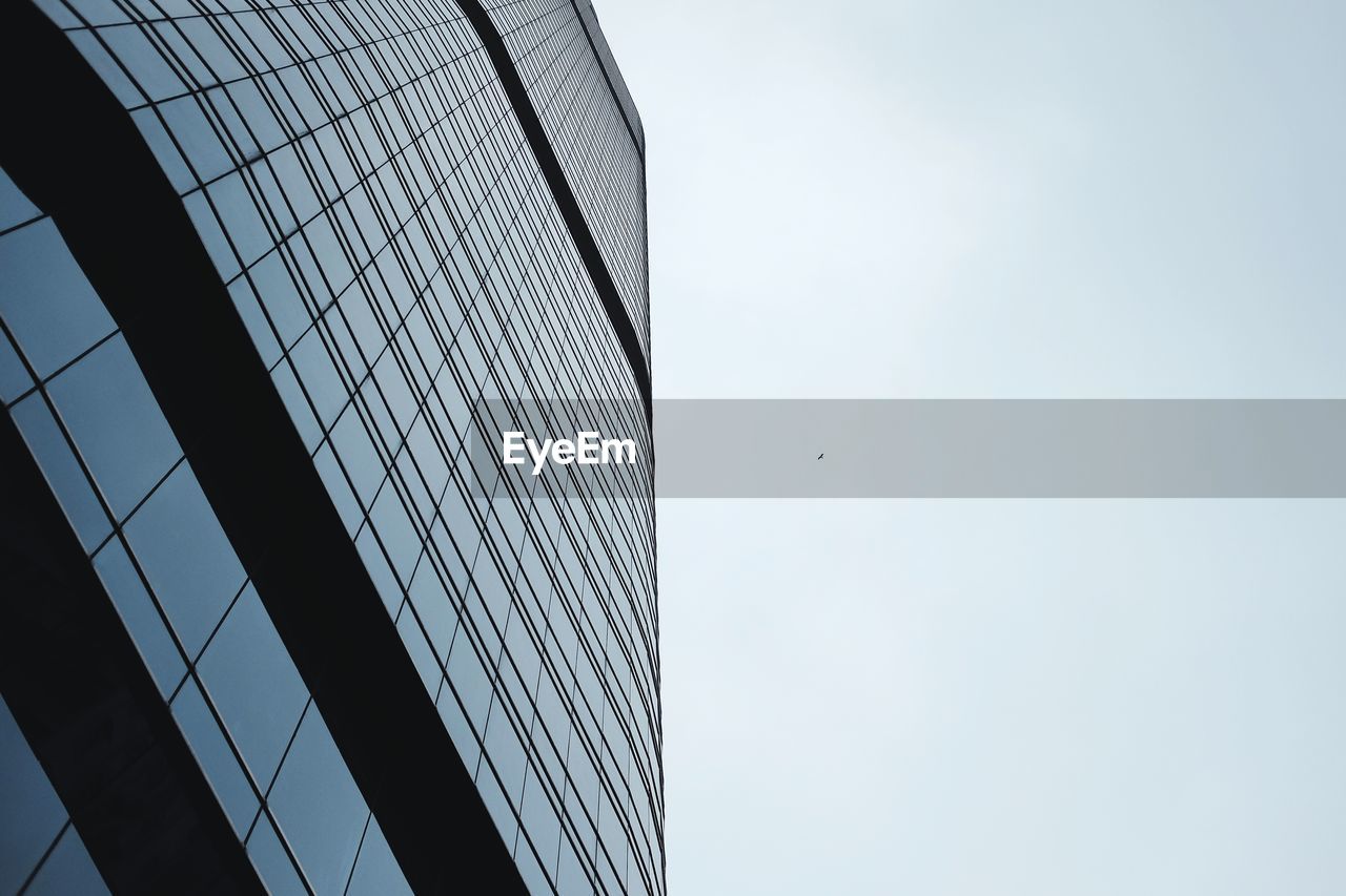 Low angle view of modern building against clear sky