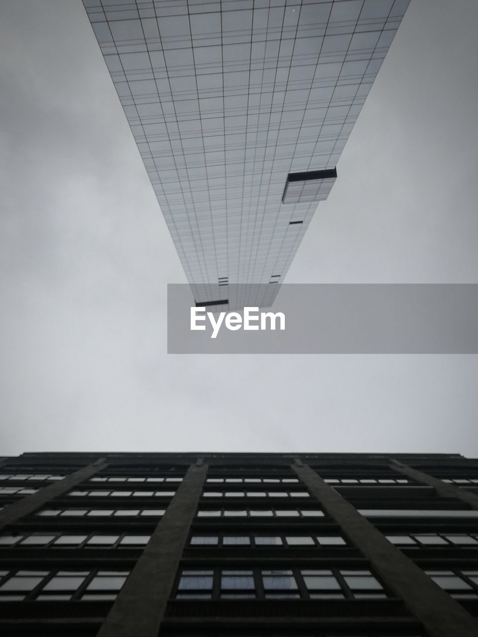 LOW ANGLE VIEW OF BUILDINGS AGAINST SKY