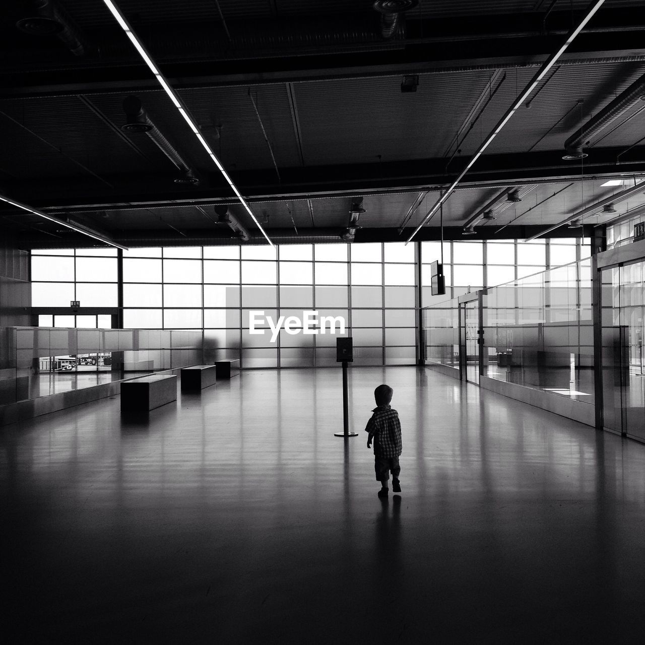 WOMAN STANDING ON FLOOR