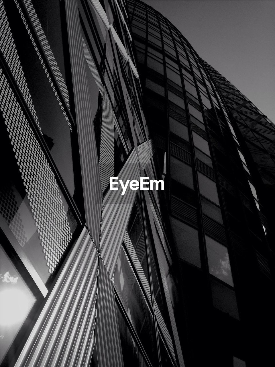 Low angle view of office building against sky