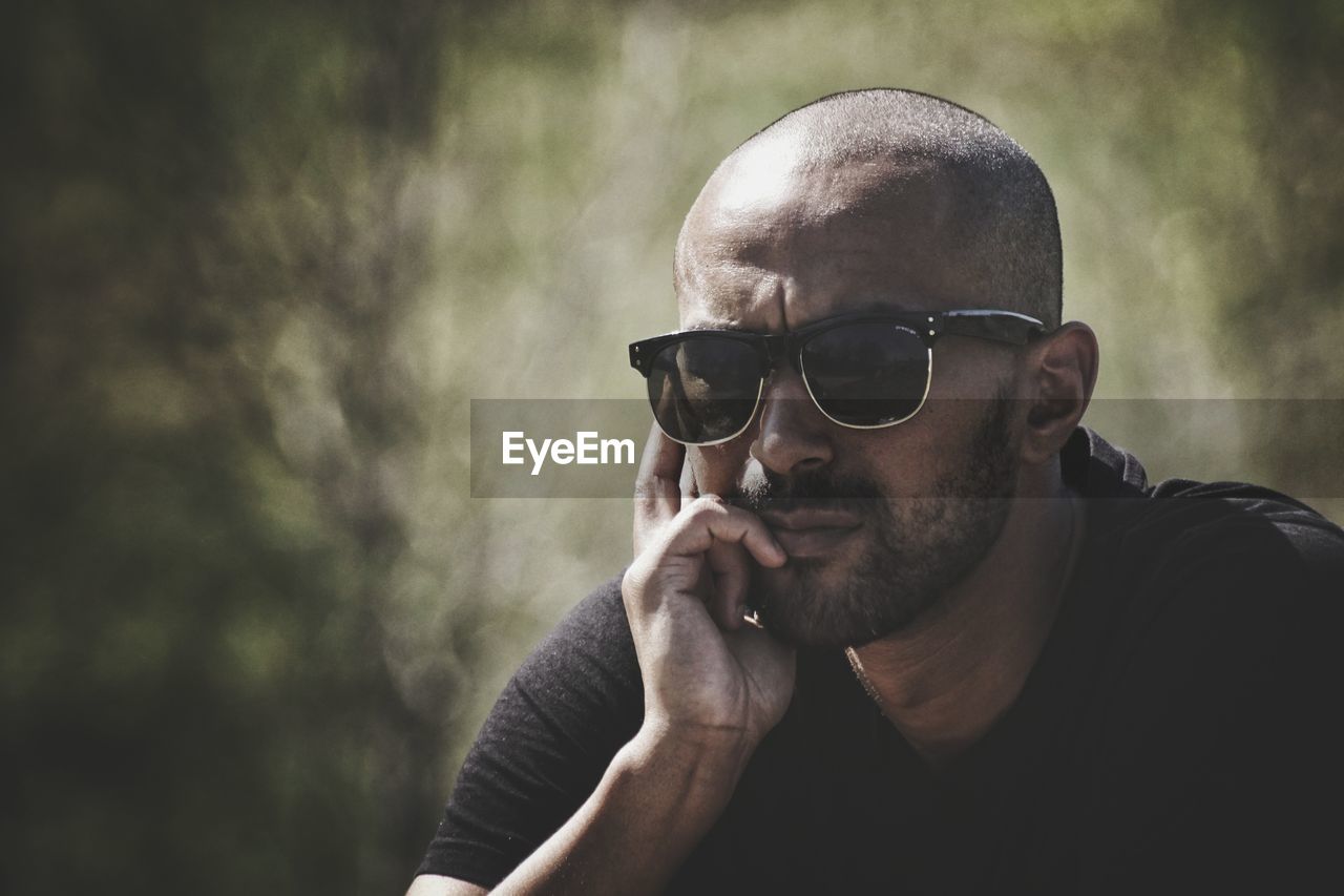 Close-up of thoughtful man looking away