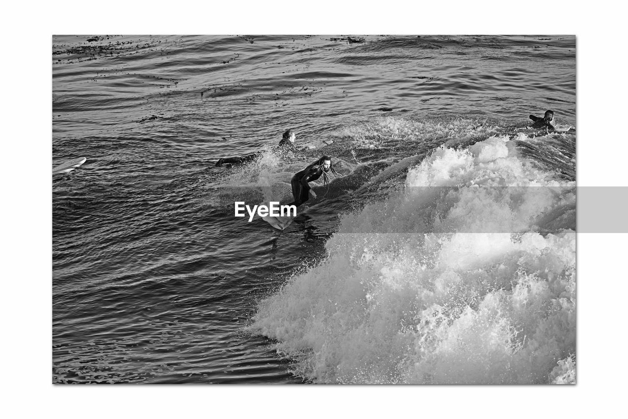 sea, water, surfing, motion, wave, sports, nature, water sports, black and white, day, auto post production filter, monochrome photography, outdoors, transfer print, surfing equipment, wind wave, beauty in nature, one person