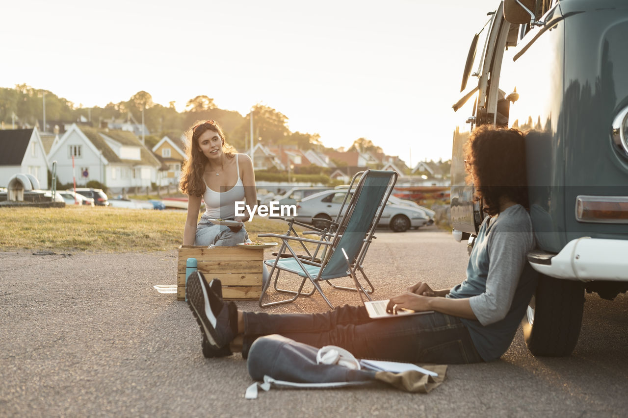 Young couple spending leisure time during vacation in evening