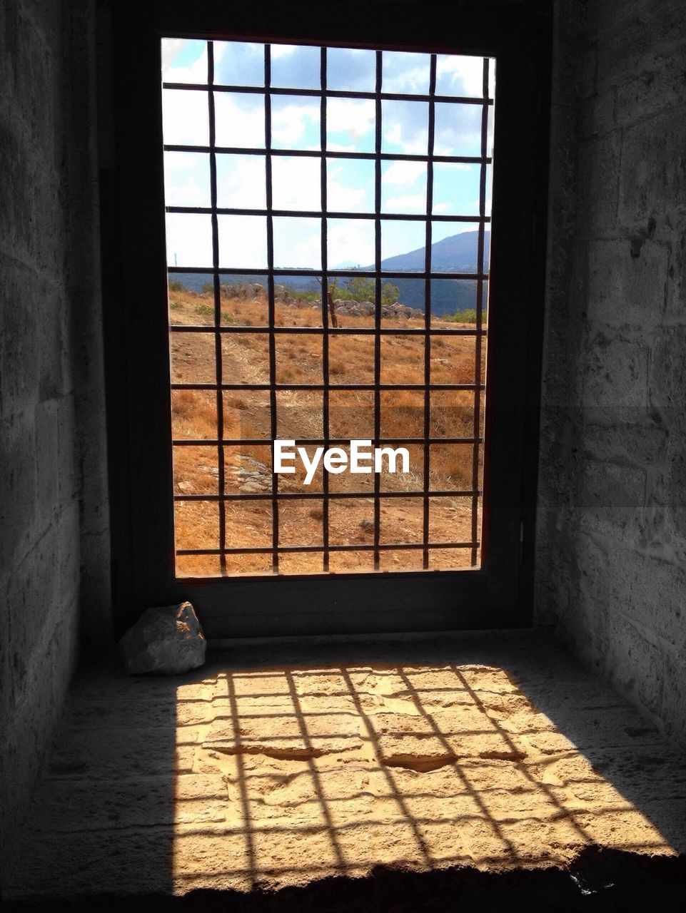 Mountain seen through window