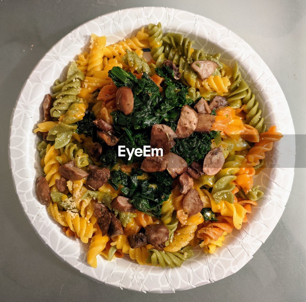 High angle view of healthy pasta and vegetables in plate