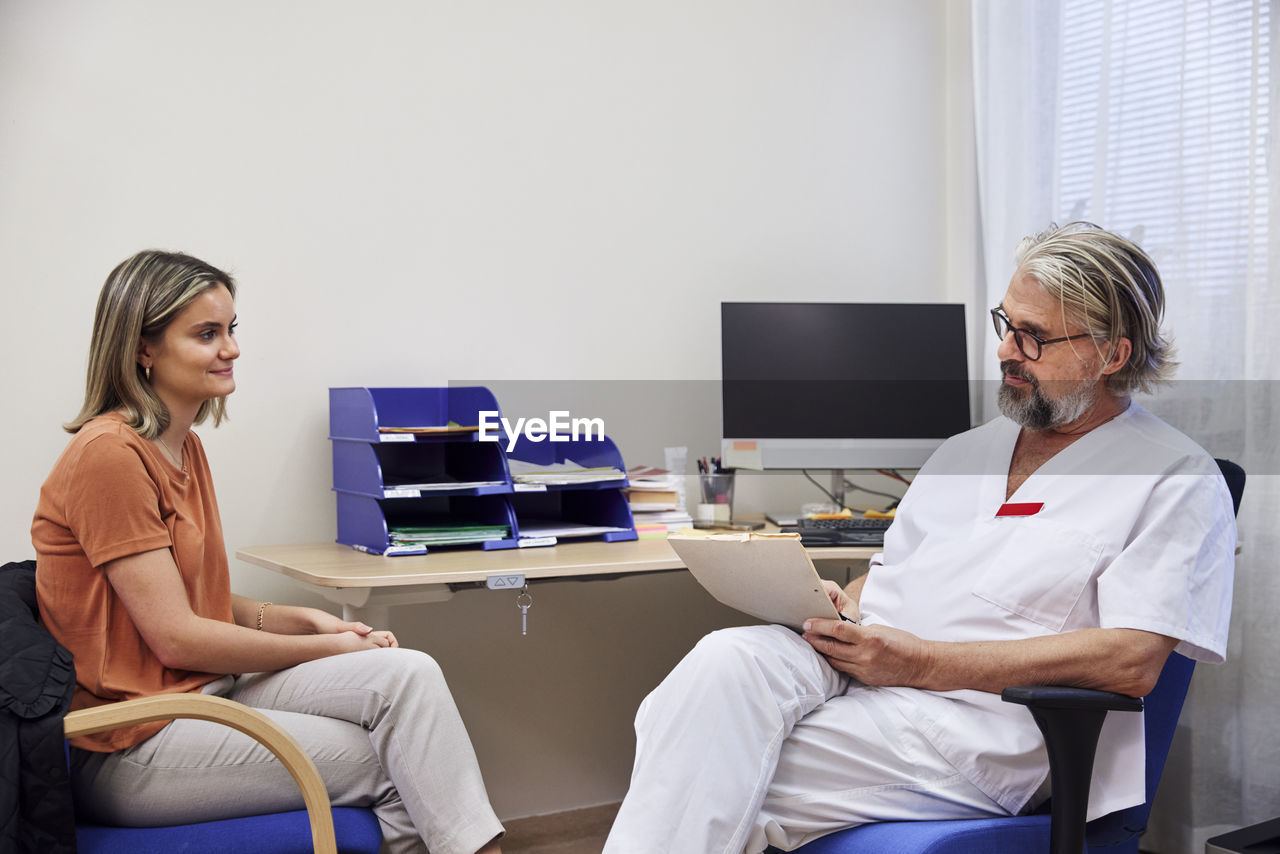 Doctor and patient in doctor's office