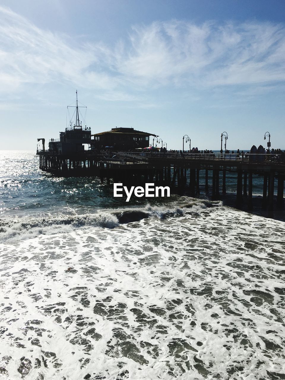 PIER ON SEA AGAINST SKY