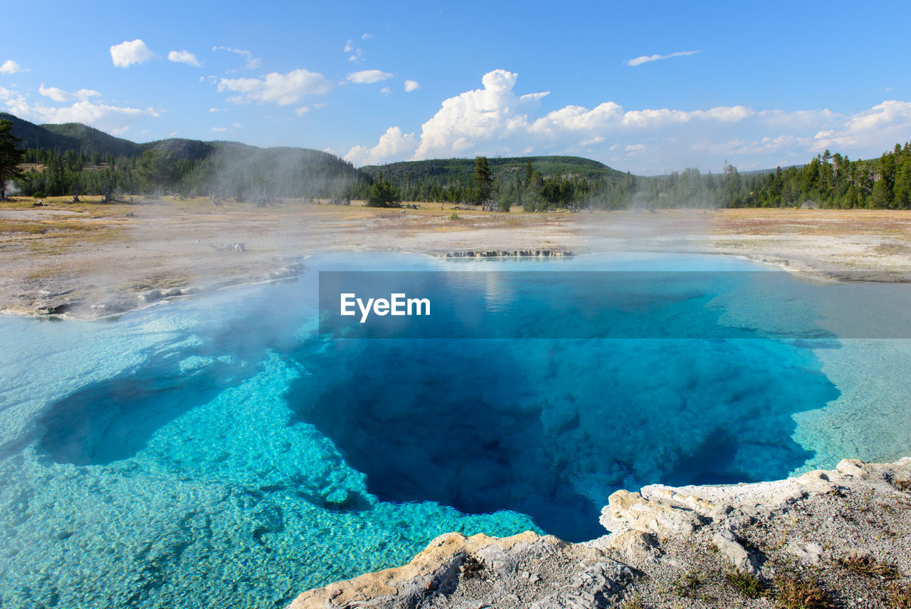 Steam emitting from hot spring in national park