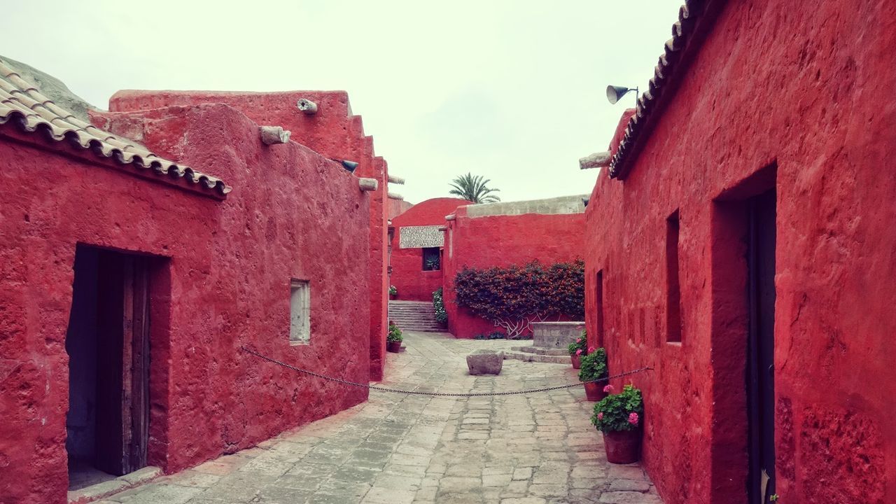 Red houses against clear sky