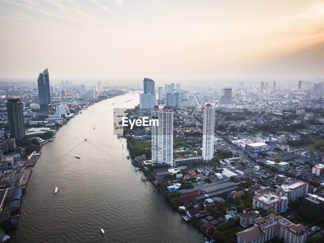 HIGH ANGLE VIEW OF MODERN BUILDINGS IN CITY