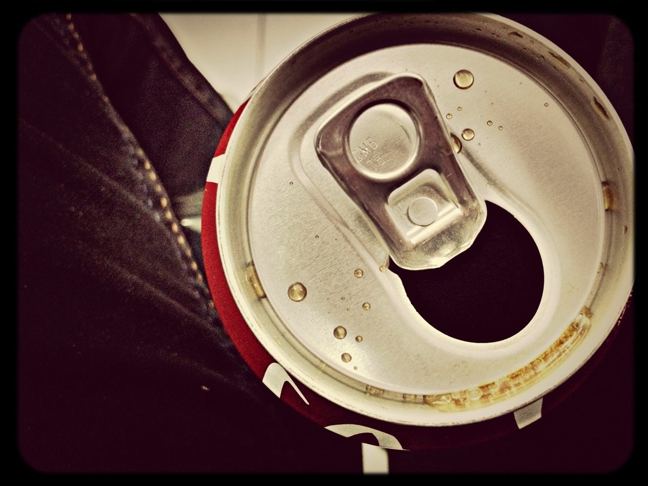 drink, transfer print, auto post production filter, drink can, close-up, no people, indoors, metal, circle, wheel, still life, directly above, can, food and drink, refreshment, high angle view