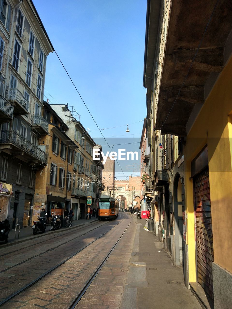 VIEW OF CITY STREET AGAINST SKY