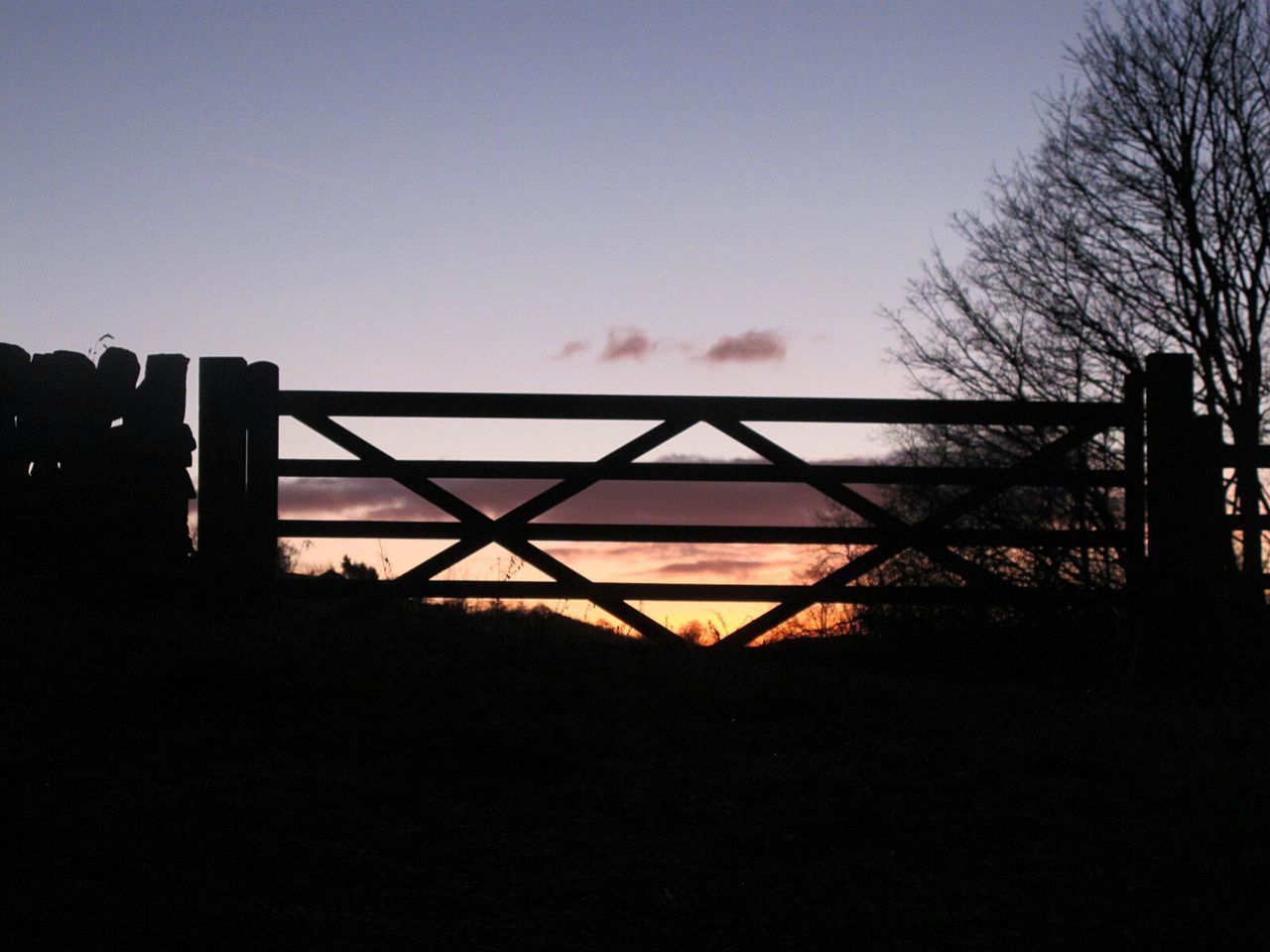 SILHOUETTE BRIDGE AGAINST SKY