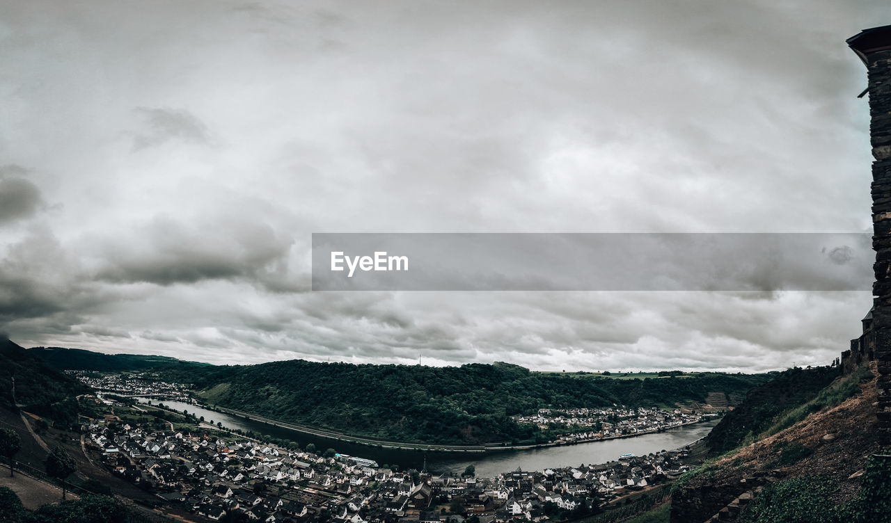 AERIAL VIEW OF ROAD BY LAND AGAINST SKY