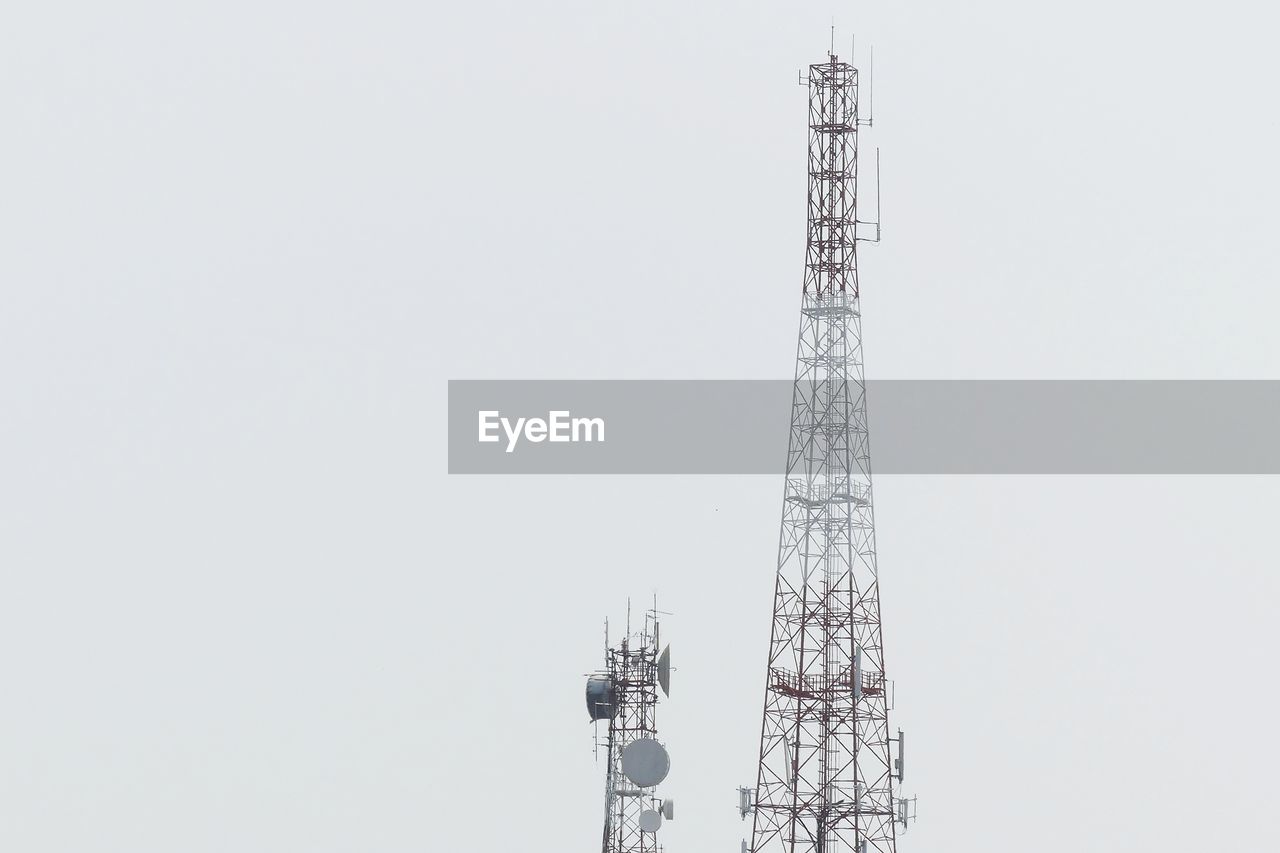 LOW ANGLE VIEW OF ELECTRICITY PYLON