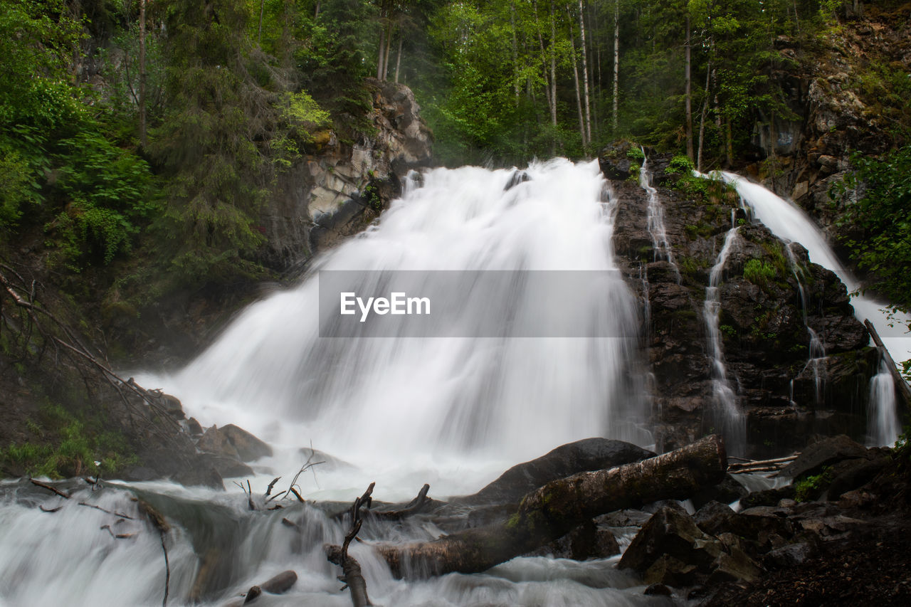 SCENIC VIEW OF WATERFALL