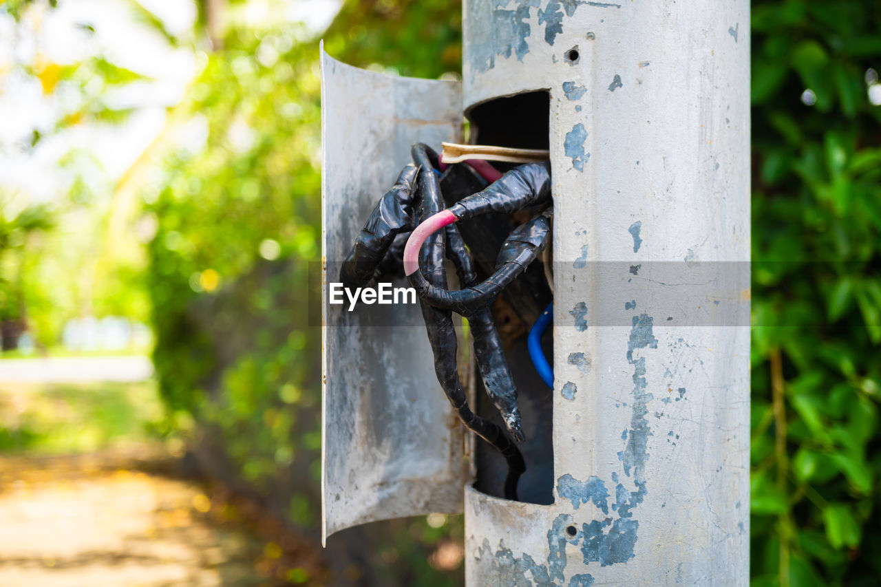 Incorrect electrical wiring in the lightbox on the electric pole. danger can occur