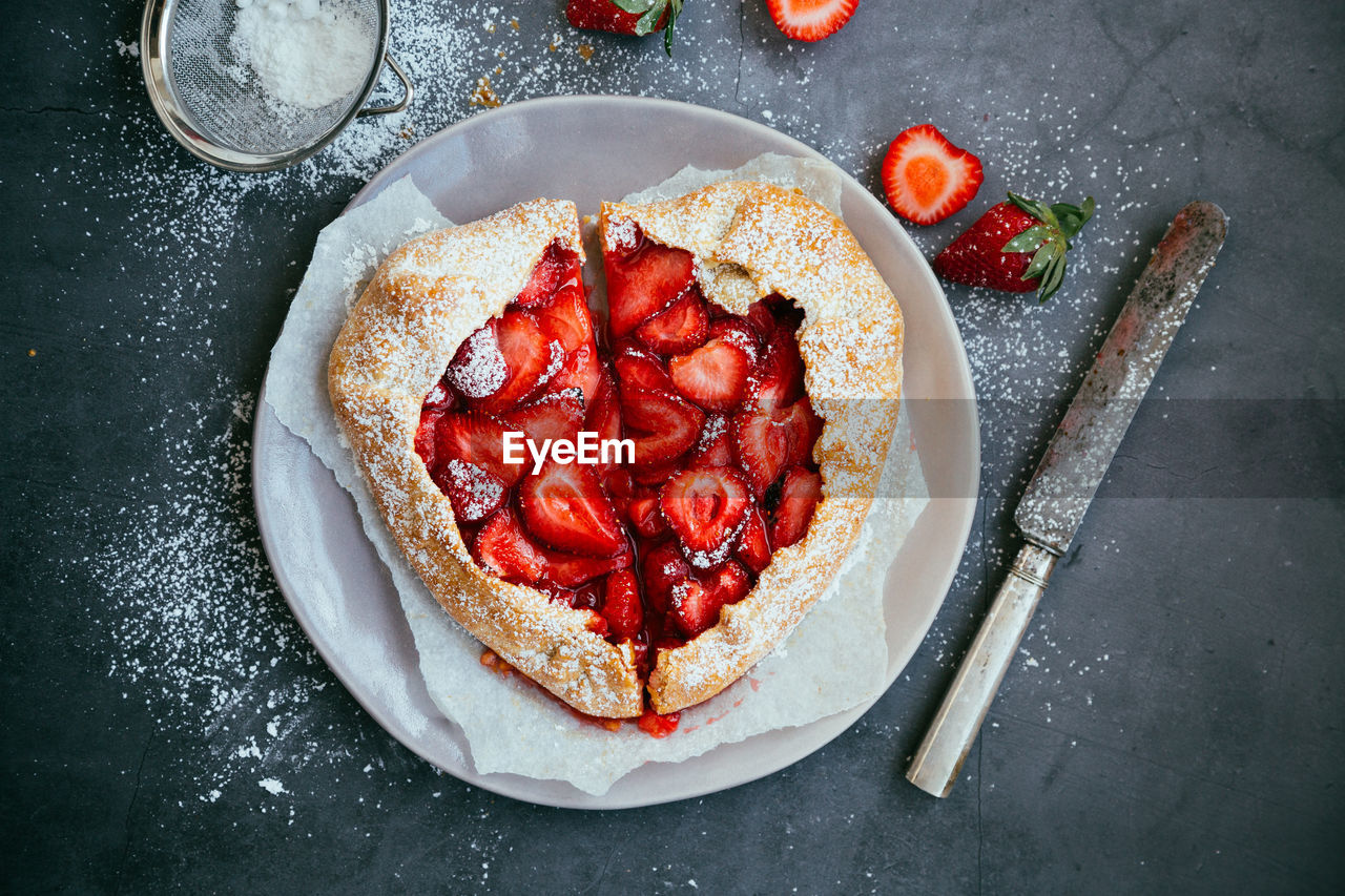 Directly above shot of strawberry tart on table