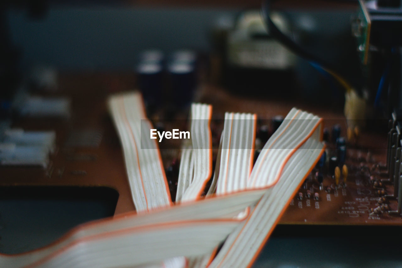 Close-up of computer equipment on table
