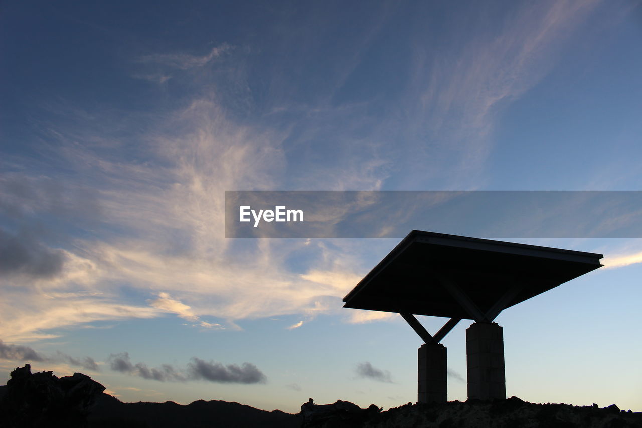 LOW ANGLE VIEW OF SILHOUETTE BUILT STRUCTURE AGAINST SKY