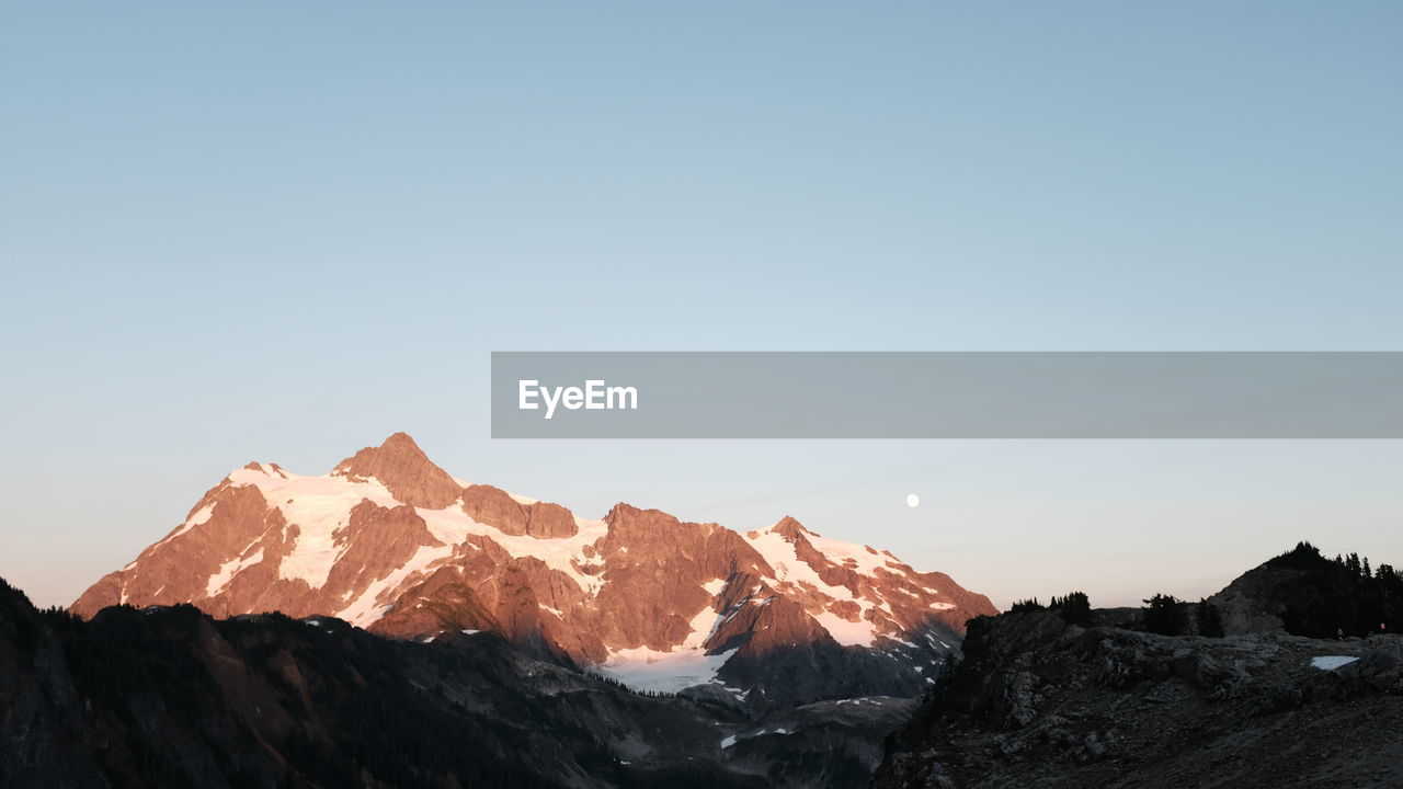 Scenic view of mountains against clear sky