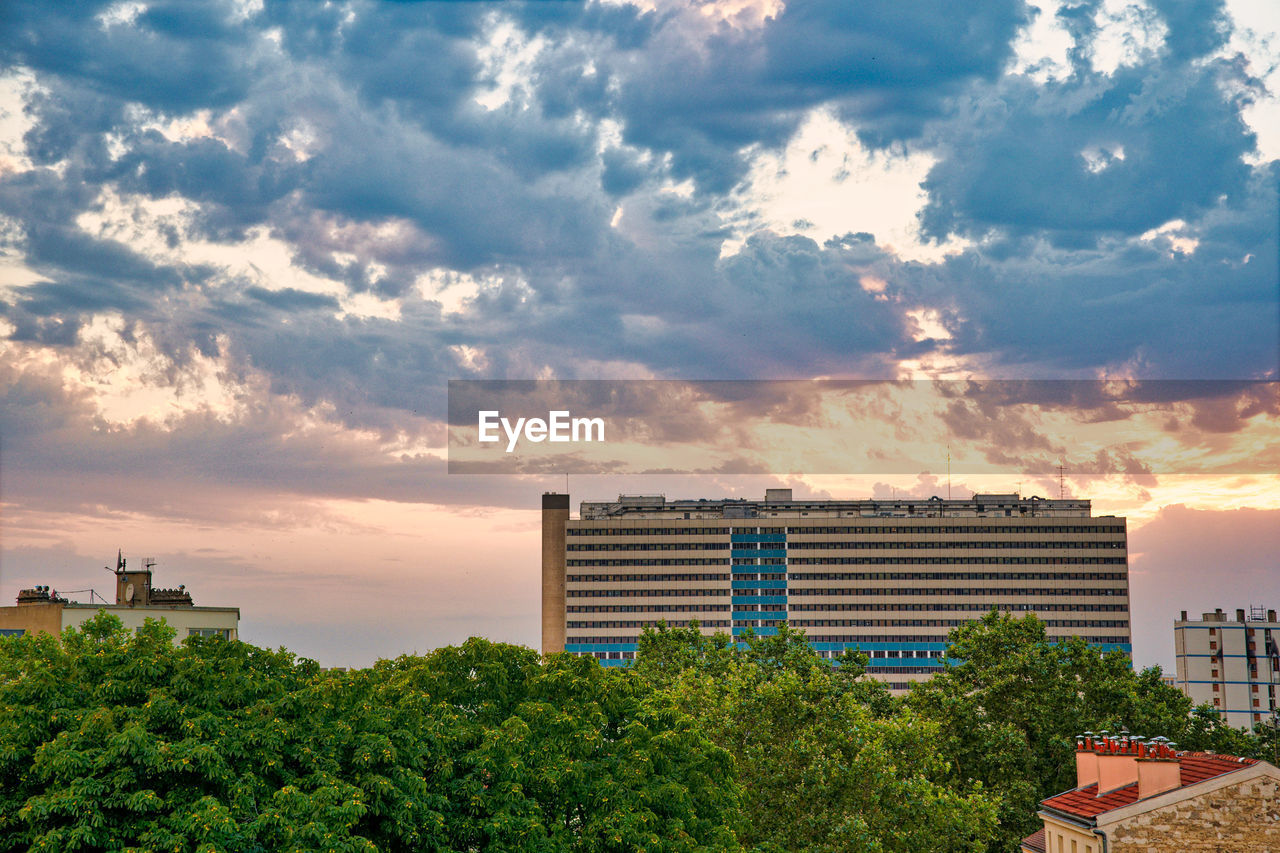 View of residential buildings against sky