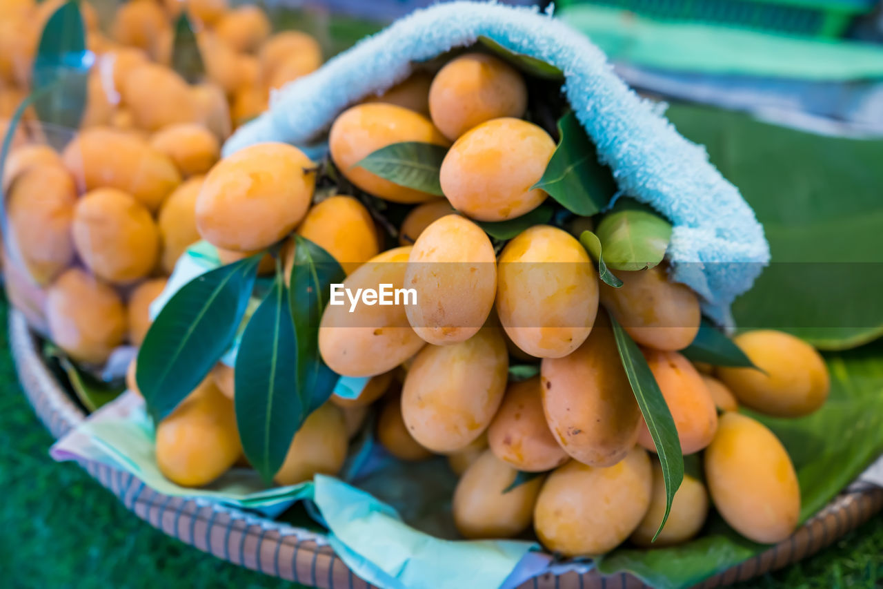 CLOSE-UP OF FRUITS FOR SALE AT MARKET