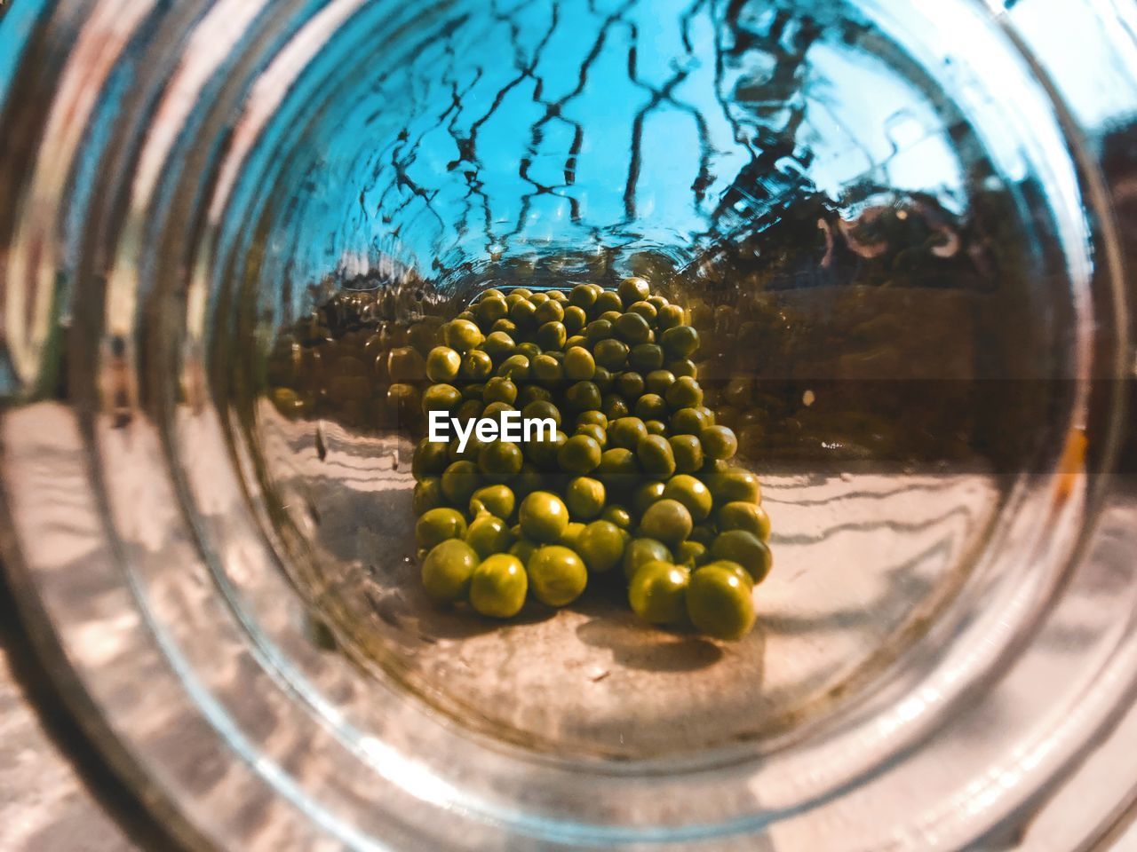 High angle view of pills in glass