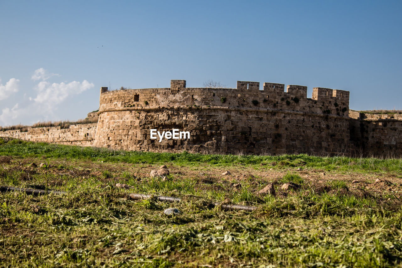 low angle view of old ruins against clear sky