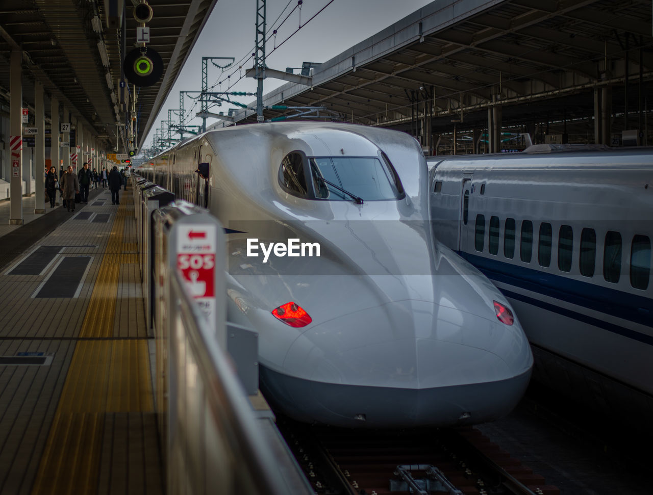 TRAIN IN RAILROAD STATION