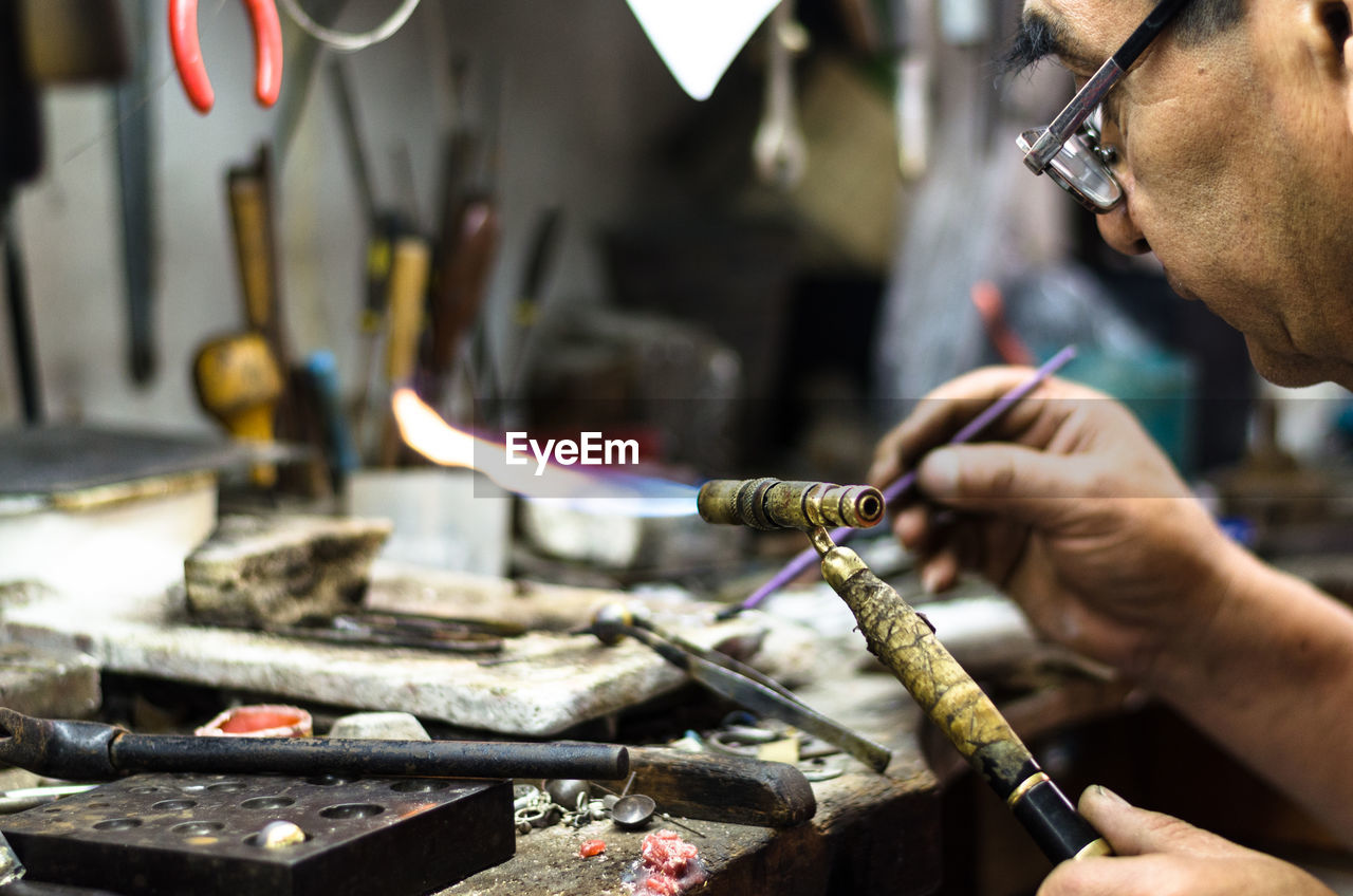 Man working on metal