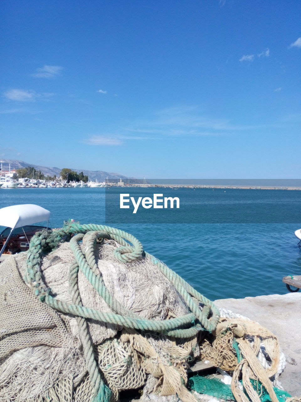 Scenic view of sea against clear blue sky