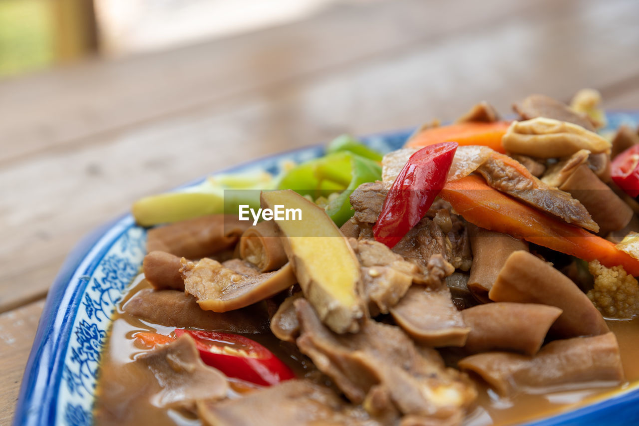 food, food and drink, healthy eating, vegetable, dish, freshness, meal, wellbeing, meat, cuisine, no people, produce, close-up, plate, table, dinner, indoors, selective focus, pepper, asian food, fruit, business, restaurant, focus on foreground